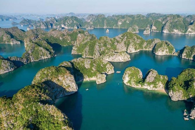 1 Day Boat Tour: HaLong Bay, Lan Ha Bay, Natural Beach and Full Moon Party - Swimming, snorkeling, and a natural beach