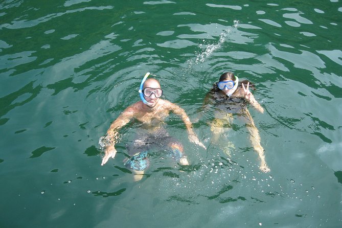 1 Day Boat Tour: HaLong Bay, Lan Ha Bay, Natural Beach and Full Moon Party - Bright Cave and Dark Cave by kayak