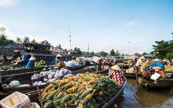 1-Day Mekong Delta Tour: Less-Touristy Cai Be & Vinh Long(Max 10) - A sampan through orchards and narrow waterways