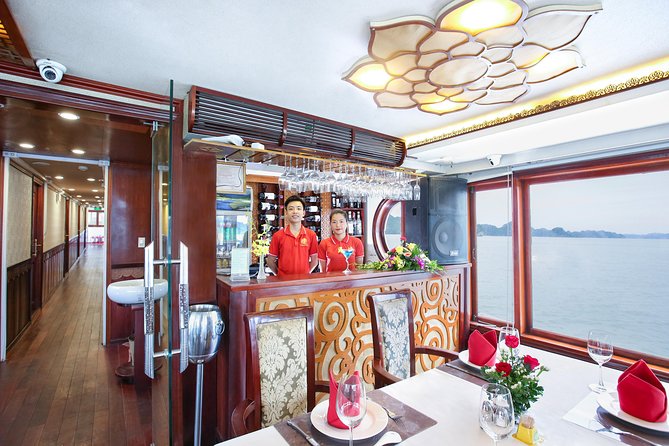 2-Day Oriental Sails Junk Cruise of Halong Bay - Sunset, cooking, and an evening on the water
