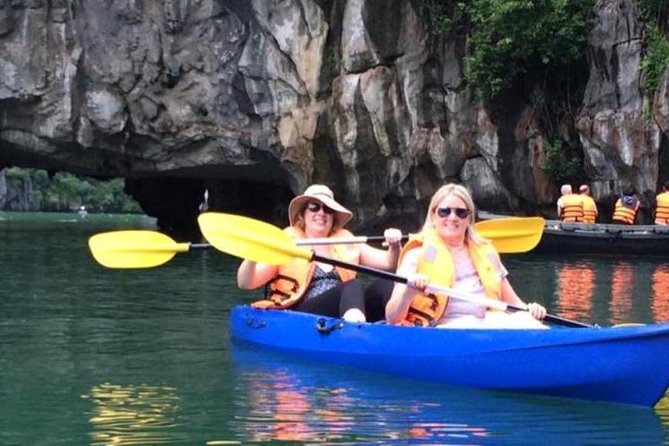 6 Hour Cruise in Hanoi - Boarding the boat and passing the limestone islets