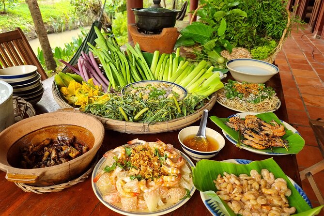 Ben Tre Mekong Zig Zag: Scooter, Sailboat, and Food (Full day) - A long Mekong lunch with time to slow down