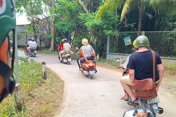 Ben Tre Mekong Zig Zag: Scooter, Sailboat, and Food (Full day) - Sailing through a quiet Mekong channel