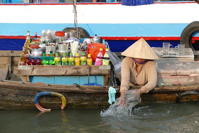 Cai Rang Floating Market - My Tho & Ben Tre - VIP Private Tour - Honey tea, music, coconut products, and banh xeo