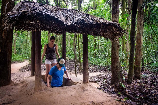 Cu Chi Tunnels and Mekong Delta 1 Day Tour With Small Group - Crawling through the Cu Chi Tunnels
