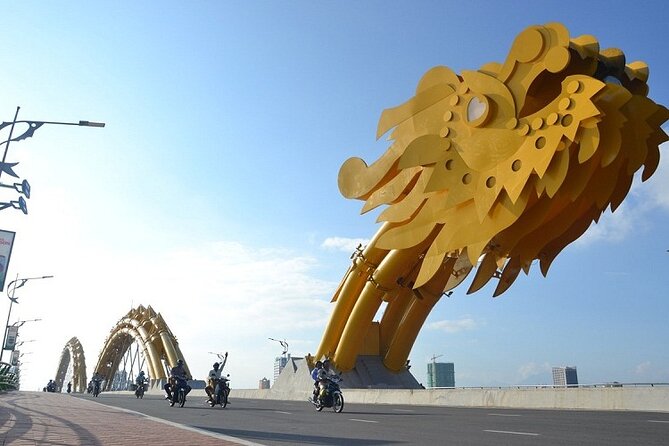 Da Nang Food Tour Motorbike & Sightseeing By Ao Dai Lady Rider - The Sun Wheel and night market bring the evening to a close