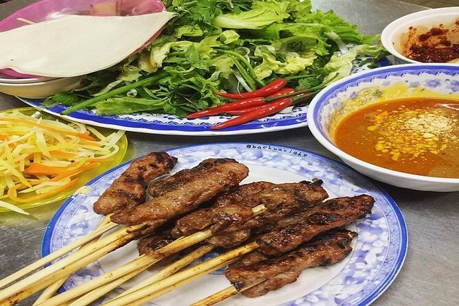 Da Nang Food Tour Motorbike & Sightseeing By Ao Dai Lady Rider - Love Bridge offers an easy start by the Han River