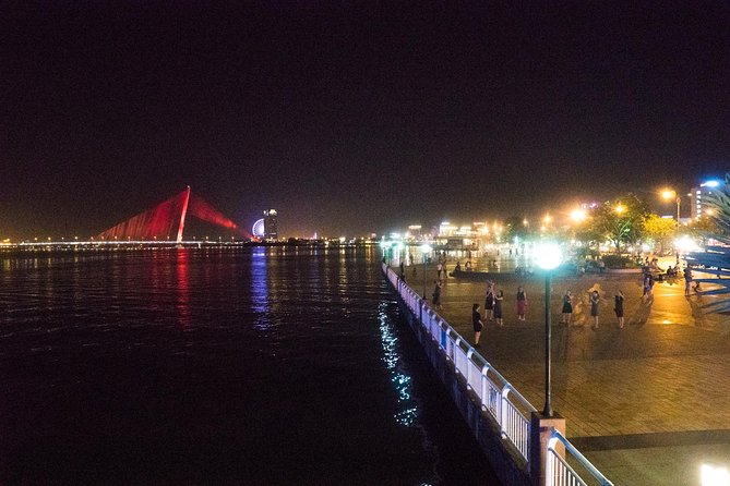 Da Nang Night Motorbike Tour & River Cruise Riding By Lady Rider - Sun Wheel, night market, and the city after dark