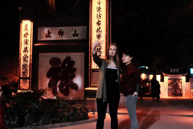 Drinks & Bites in Hanoi Private Tour - Hang Dau Street and the first savory bite