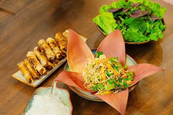 Experience Hanoi Cooking Class with Free Wine Tasting - From market ingredients to four Vietnamese dishes
