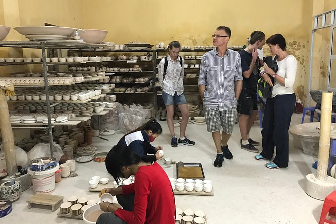 Explore Bat trang village & Ceramics factories with local guide - Entering the working ceramics factories
