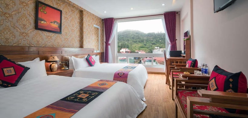 From Hanoi: 2-Day Sapa Limo Bus Tour & Fansipan Peak Visit - Arriving in Sapa and settling into the hotel
