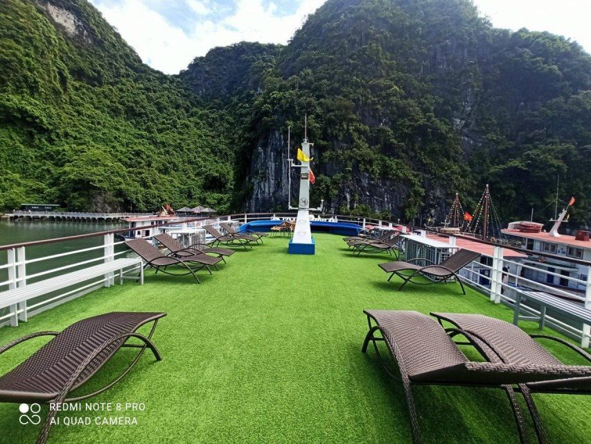 From Hanoi: Halong Bay 1 Day Trip Visit Cave, Island, Kayak - Titop Island: climb, swim, or sit by the beach
