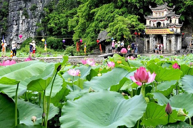 From Hanoi: Hoa Lu, Tam Coc, and Mua Cave Scenic Day Trip - Tam Coc by boat beneath the limestone peaks