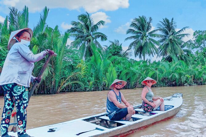 From HCM City: Mekong Delta Tour with Sampan Journey - Sampan canals beneath coconut palms