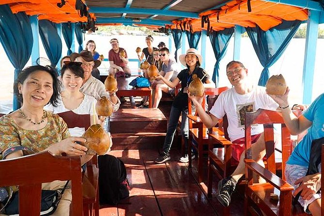 From HCM City: Mekong Delta Tour with Sampan Journey - Island village life, fruit, honey tea, and music
