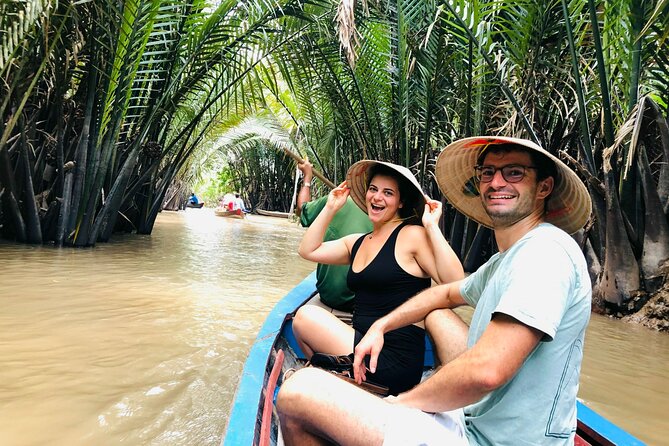 From Ho Chi Minh City: Discover Mekong Delta & Coconut Village - Boat travel on the Upper River
