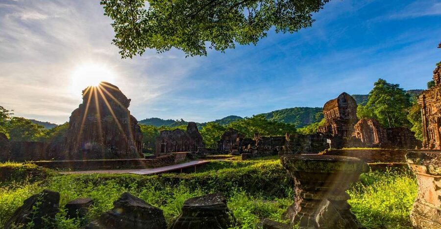 From Hoi An: Day Tour of My Son Temples and Marble Mountain - My Son’s brick towers in a green valley