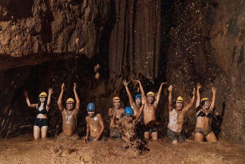 From Phong Nha/DongHoi: Paradise Cave and Zipline Dark Cave - Paradise Cave begins with a jungle ride and a climb