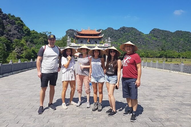 Full-Day Tour Hoa Lu, Tam Coc Boat Trip and Mua Cave - Leaving Hanoi in a 17-seat limousine