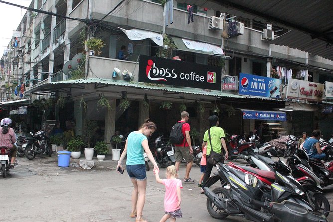 Good Morning Saigon Tour by Motorbike and Scooter - District 5 and the view across different Saigons
