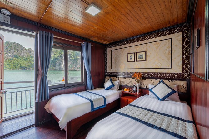 Halong Bay 2 Days 1 Night Traditional Boat - Ti Top Island adds a beach and a viewpoint