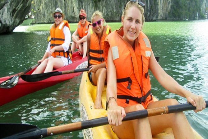 Halong Bay Day Tour: Visit Cave Island Kayaking Swimming Lunch - Lunch while the limestone towers pass by