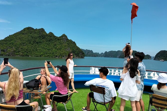 Halong Bay Day Tour With Titop Island, Cave, Kayak & Lunch - Guides, group size, and the feel of the day