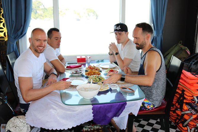 Halong Day Tour: Islands, Cave, Kayak. Lunch. Transfers - The guides make a practical difference