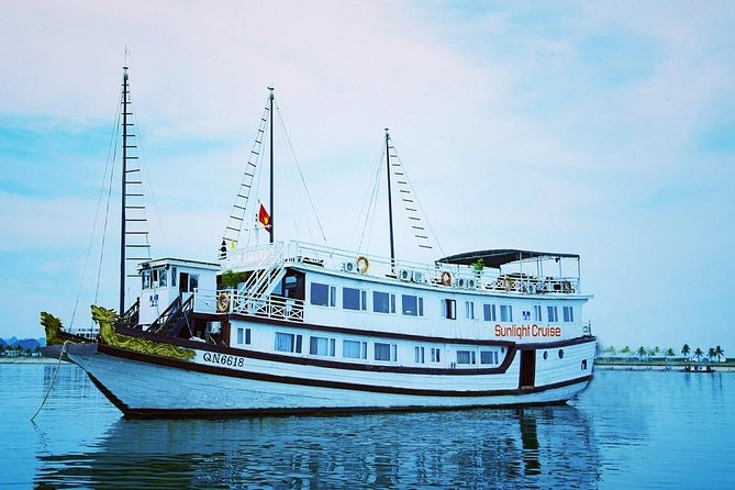 Halong deluxe cruise 2D/1N: Surprise cave, Titop island, Full Meals, best prices - Titop Island, beach time, and the climb