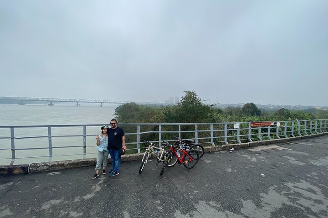 Hanoi City Bike Tour through Banana Island & Food Tasting - Crossing historic Long Bien Bridge