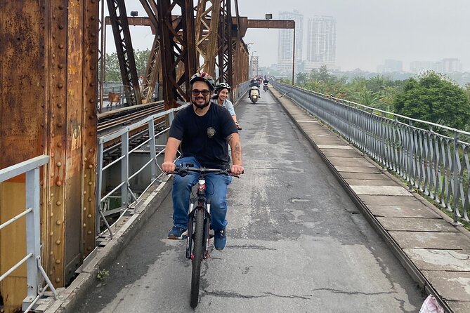 Hanoi City Bike Tour through Banana Island & Food Tasting - Hanoi’s railway tracks and the café-lined route