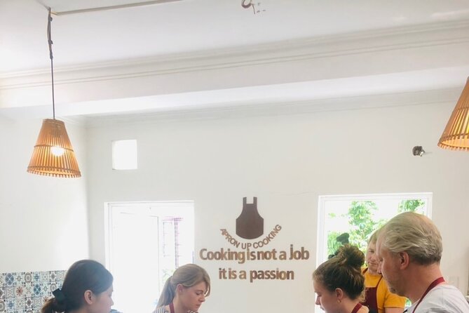 Hanoi Cooking Class Learning 5 Dishes including Banh Xeo - Eating your own cooking with coffee and rice liquor