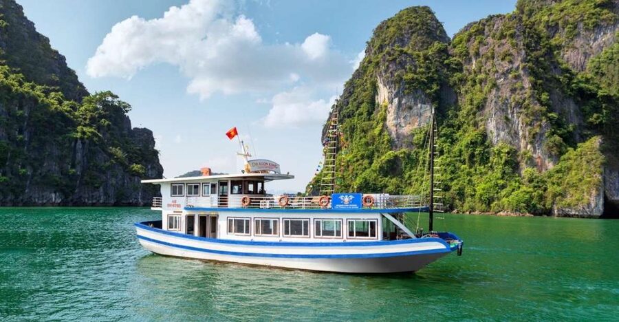 Hanoi: Halong Bay Day Trip with Titop Island, Cave, & Kayak - Leaving Hanoi and reaching Tuan Chau Harbor
