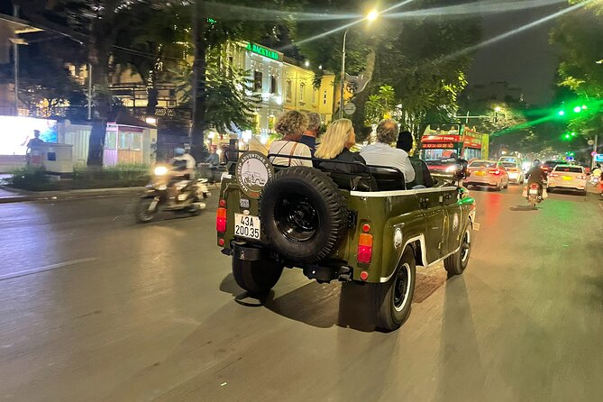 Hanoi Jeep By Night Street Food Tour and Train Street Experience - Bridges, ceramic walls, and Hanoi from the river roads
