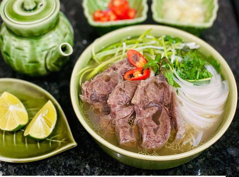Hanoi: Street Food Tour with Train Street & Hidden Alleyways - The food stops: familiar names, local versions