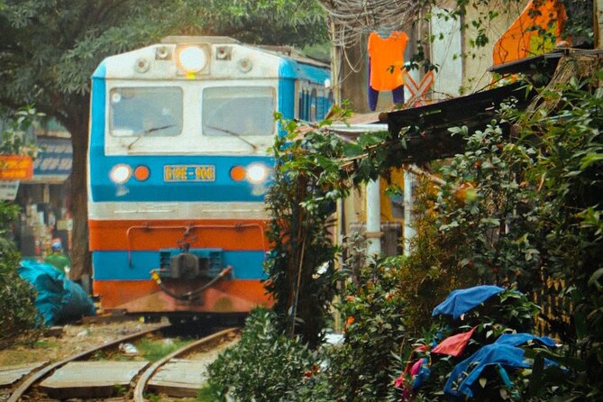 Hanoi Walking Street Food Tour with Train-Street Visit - Bun cha and spring rolls start the meal