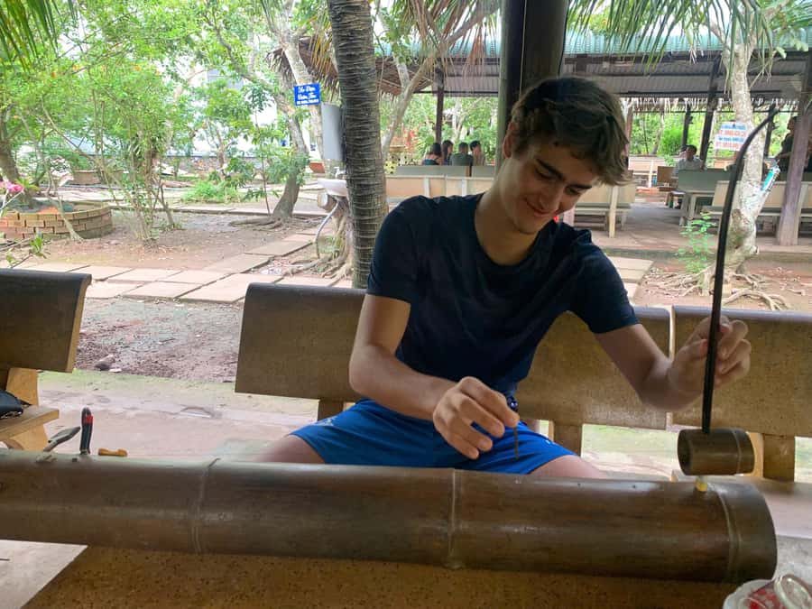 HCM: Authentic Mekong Delta - Boat, TukTuk, Khot Cake Making - Honey, grapefruit, fruit, and coconut candy