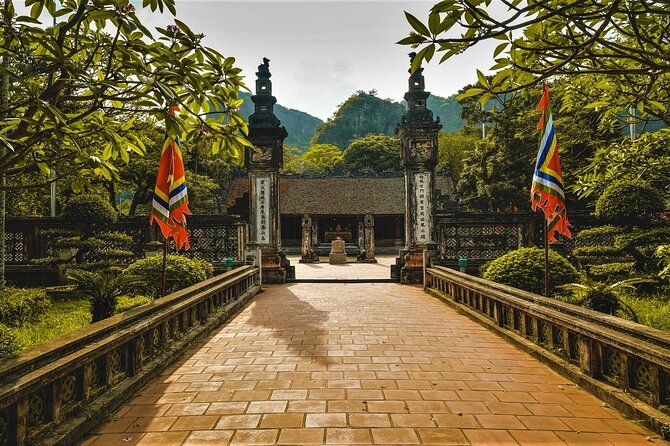 Hidden Ninh Binh Luxury Full Day Group Tour (Tam Coc - Hoa Lu) - Cycling through rice fields and limestone peaks