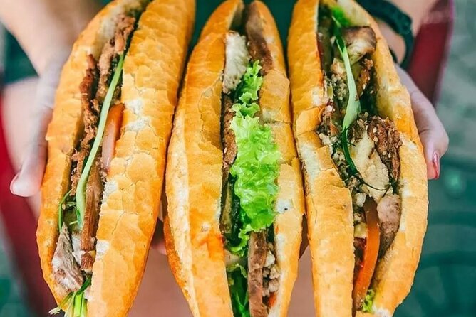 Ho Chi Minh City Street Food Tour & Sightseeing By Motorbike - The Cambodian Market’s snacks and local energy