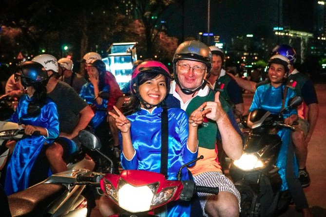 Ho Chi Minh Night Tour by Motorbikes with Female Rider | KissTour - Ho Thi Ky Flower Market adds color and food