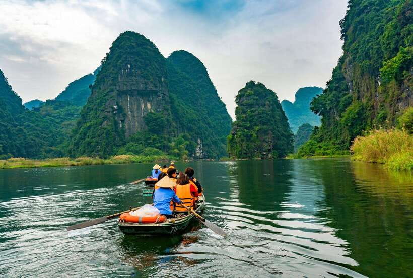 Hoa Lu, Tam Coc, & Mua Cave Day Trip with Lunch & Limousine - Leaving Hanoi in the limousine bus