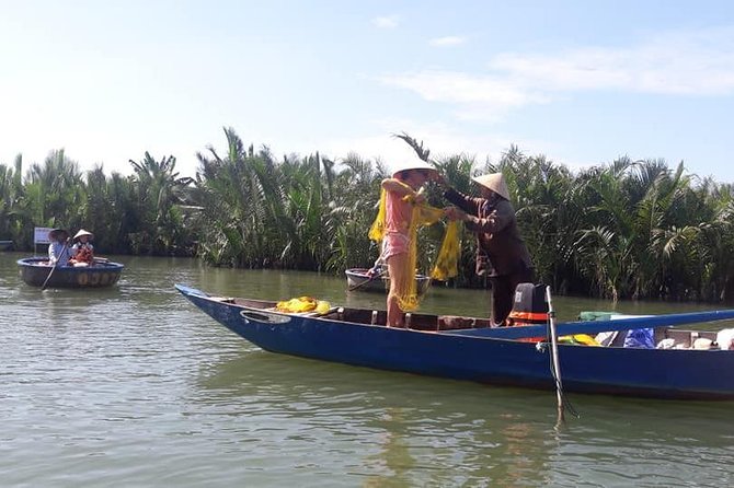Hoi An Countryside Biking Tour(Vegetable village -basket boat - fishing village) - The water coconut palm boat ride