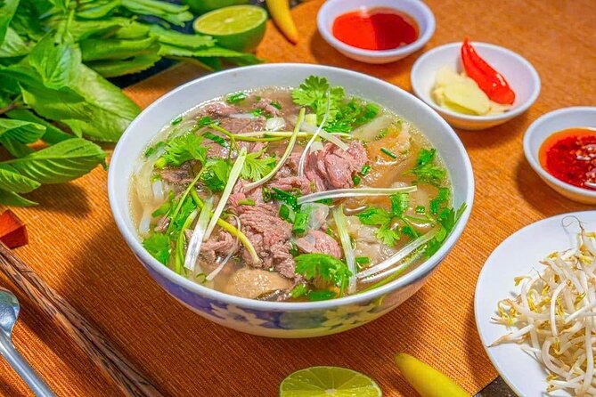 (HOT) Hanoi Guided Street Food and Train Street Tour with Local - Group size, guide style, and pace