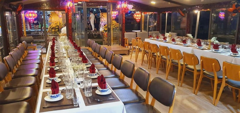 Hue: Perfume River Dinner Cruise with Traditional Show - Robes, photos, and the flower-lantern release