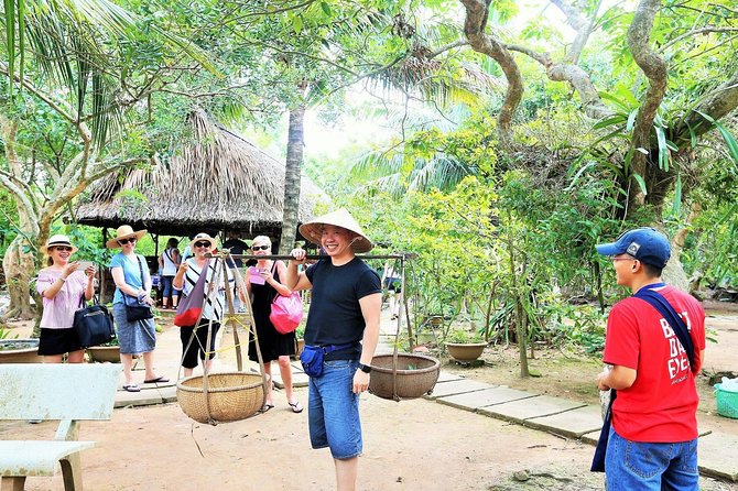 Mekong Delta Discovery Tour from Ho Chi Minh - Xe Loi carts, bees, and tropical fruit