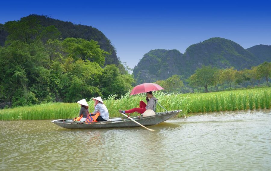 Ninh Binh Daily: Hoa Lu, Mua Cave, Tam Coc, Bike & Swimming - Tam Coc by sampan through three caves