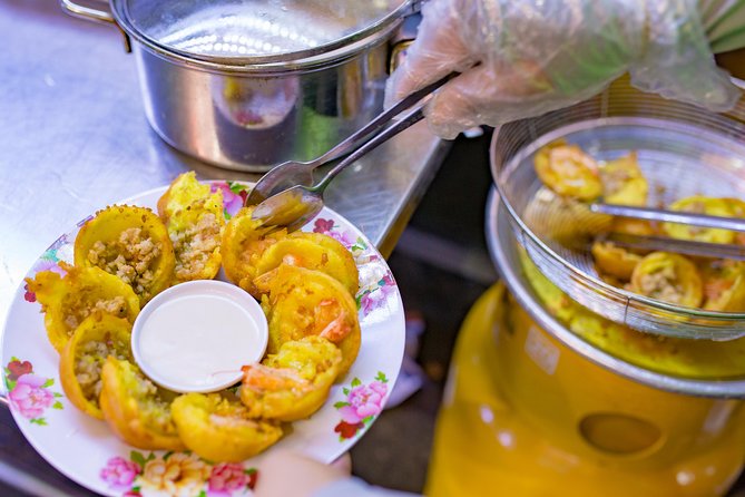 Private Street Food Evening Walking Tour in Ho Chi Minh City - Barbecue streets and bo la lot bring the strongest local flavors