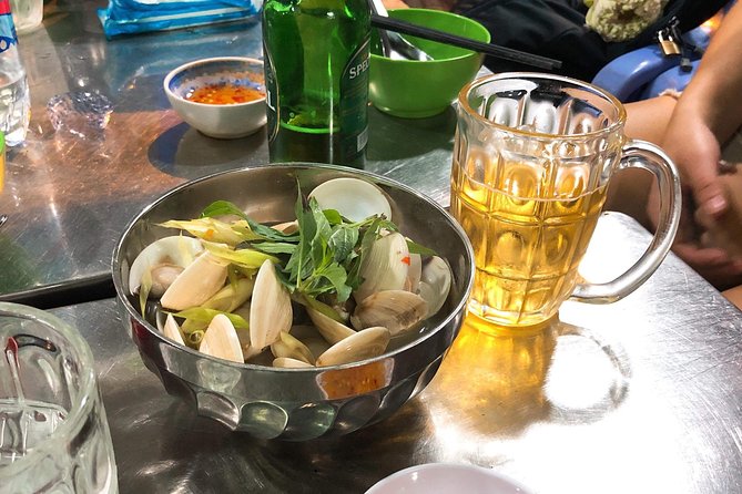 Saigon By Night and Street Food By Motorbike | Opt: Ao Dai Riders - Why a motorbike is the right way to see Saigon at night