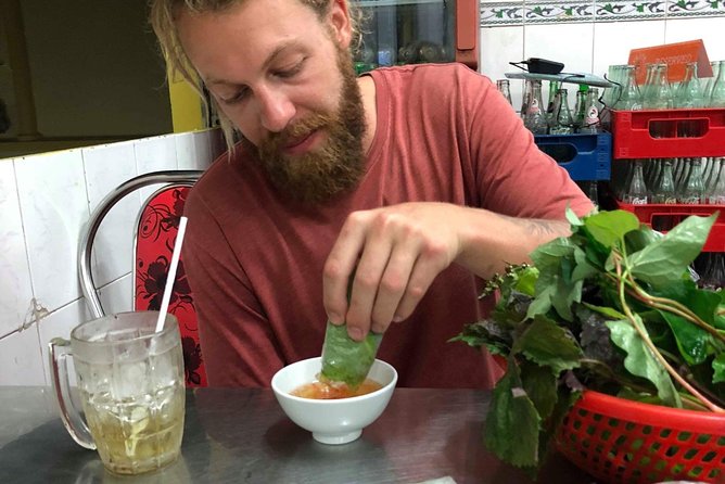 Saigon By Night and Street Food By Motorbike | Opt: Ao Dai Riders - District 4 finishes the night with serious street food